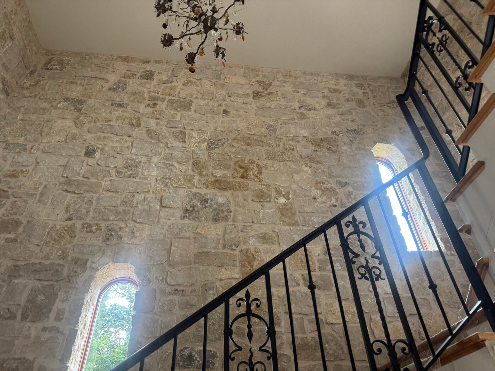 Custom natural stone foyer completed by Blue Peak Earth and Stone